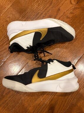 Nike Youth Black and Gold Low-Top Sneakers with White Accents